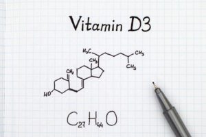 Chemical formula of Vitamin D3 with black pen.
