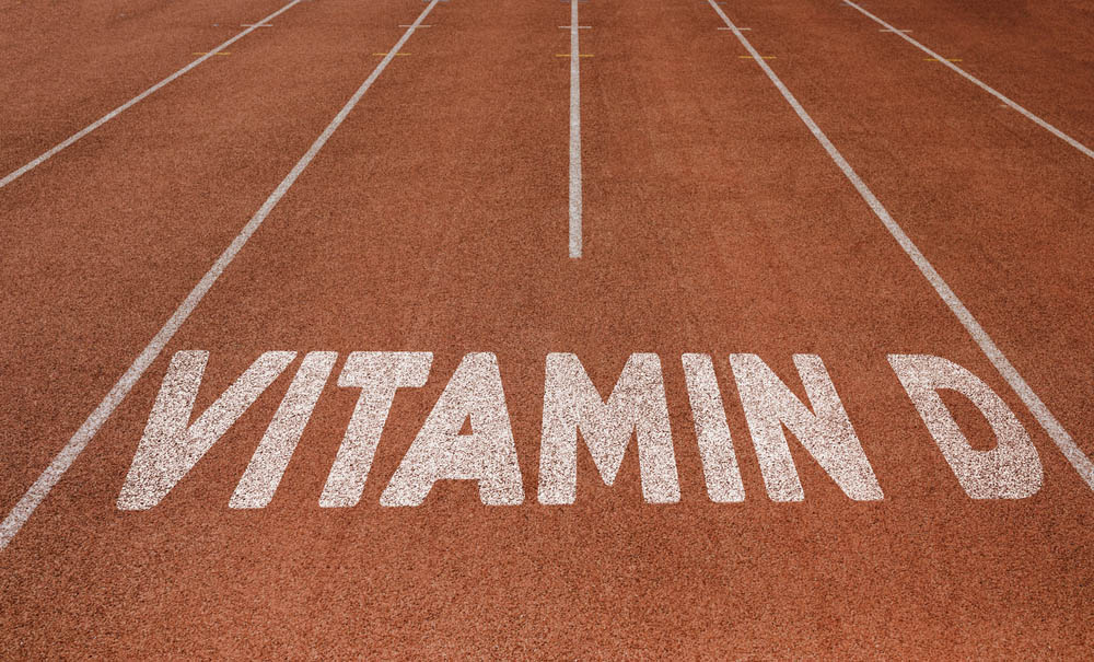 Vitamin D written on running track, New Concept on running track text in white color