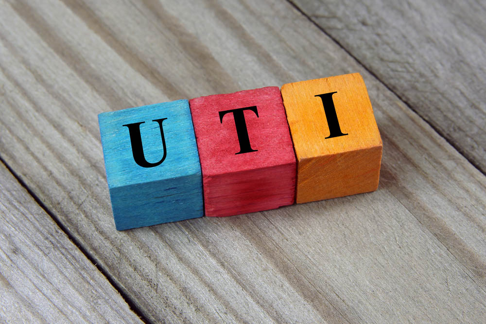 UTI spelled in wooden cubes