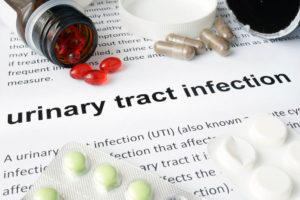 Paper with urinary tract infection and pills